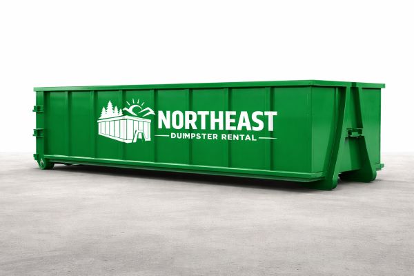 Green Northeast Dumpster Rentals roll-off dumpster parked in a residential driveway